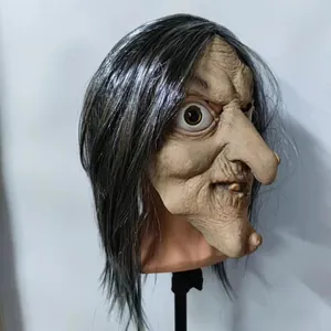 Creepy witch mask detail with gray synthetic hair and hooked nose for Halloween prop
