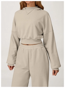 Detail view of ribbed cuffs and elastic high waist on oatmeal leisure sportswear set