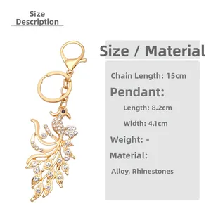 Detail view of peacock keychain size 8.2x4.1cm with crystal rhinestones and lobster clasp