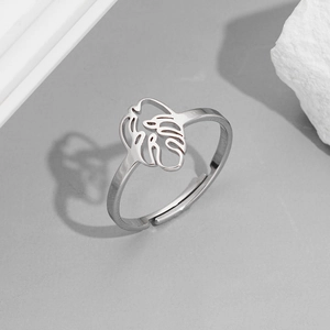 Silver adjustable stainless steel ring featuring a hollow monstera leaf design for women