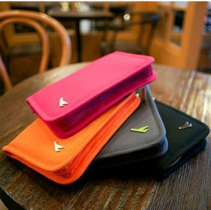 Versatile large capacity travel passport organizer wallets in four vibrant colors
