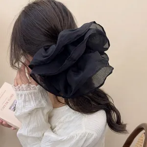 Oversized French style black layered mesh scrunchie for elegant ponytail styling