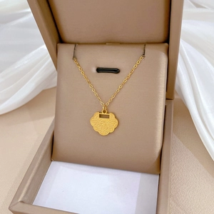 Minimalist gold titanium steel necklace with Fu lock pendant in a premium gift box