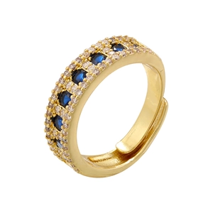 Macro shot of 18K gold plated ring featuring blue stones and white zircon accents