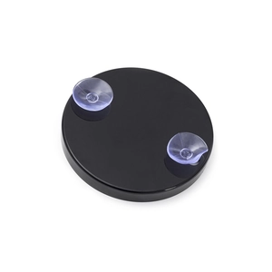 Detail view of round black vanity mirror base with dual clear suction cups for bathroom
