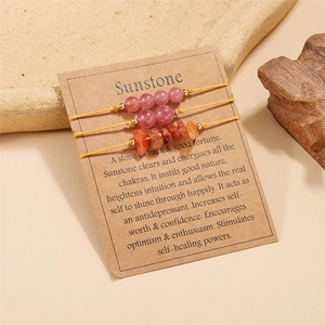 Detailed view of Sunstone crystal bead bracelet set with natural irregular stone chips