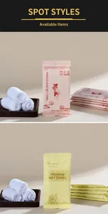 Detail of premium disposable wet towel packaging with elegant floral pattern designs