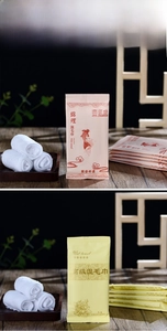 Detail of premium disposable wet towel packaging with elegant floral pattern designs