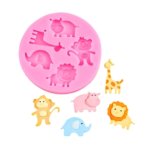 Pink silicone mold with animal shapes including lion giraffe and elephant for DIY crafts