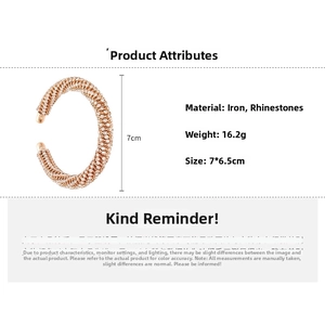 Detail view of rose gold C-shaped cuff with rhinestones showing dimensions and weight