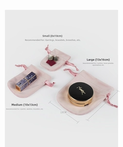 Detailed view of pink velvet drawstring pouches in small, medium, and large sizes