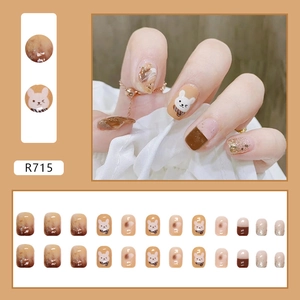 Mocha coffee press-on nails with cute bunny designs and golden glitter finish