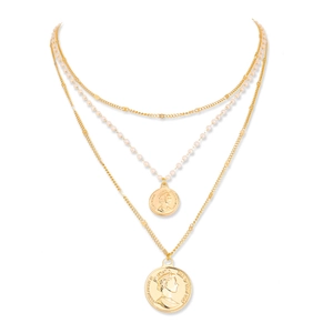 Three-layer gold coin necklace with pearls and engraved pendants on a white background