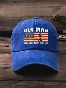 Detailed view of Oldman flag print on a blue washed cotton vintage baseball cap