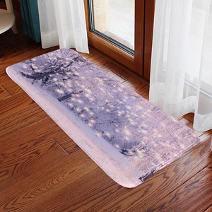 Purple forest flannel bath mat on wooden floor featuring a dreamy tree silhouette pattern