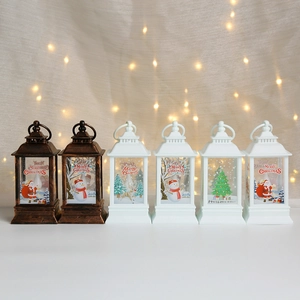 Christmas lantern ornaments with bronze and white finish featuring festive holiday patterns