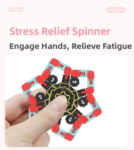 Close-up of hand holding a colorful mechanical transformable fidget spinner toy for stress relief