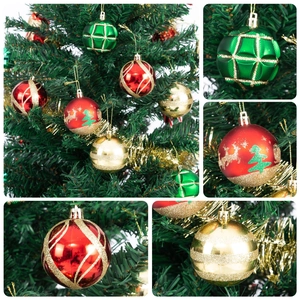 Detail of red, gold and green Christmas baubles with glitter and reindeer patterns