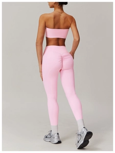 Detail of pink high-waisted yoga leggings featuring scrunch butt design for fitness