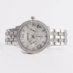 Elegant silver Geneva watch for women with rhinestone-studded bezel and metal link bracelet
