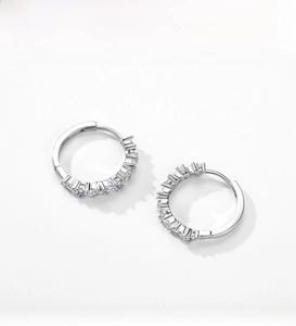 Detailed close-up of S925 sterling silver hoop earrings with inlaid cubic zirconia
