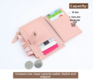 Detailed view of pink short wallet interior showing card slots and zipper coin pocket