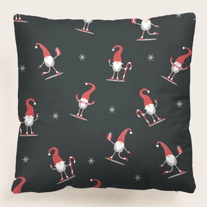 Detalle de funda de cojín navideño con motivos de Papá Noel y cremallera invisible