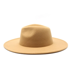 Detail view of a vintage khaki wool felt fedora hat with a stylish 9cm wide brim