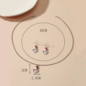 Detail of enamel snowman necklace and earrings set with 45cm chain and 2cm pendant