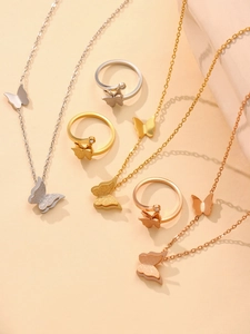 Detailed set of 18K gold-plated butterfly necklaces and rings in three elegant colors