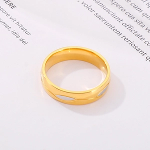 Top-down view of a 18k gold plated stainless steel ring with hollow geometric patterns