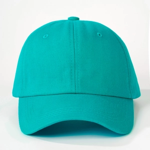 Detailed front view of teal cotton twill baseball cap with six-panel structure and curved brim