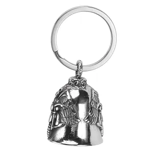 Vintage silver motorcycle bell keychain with 3D embossed wings and anchor patterns
