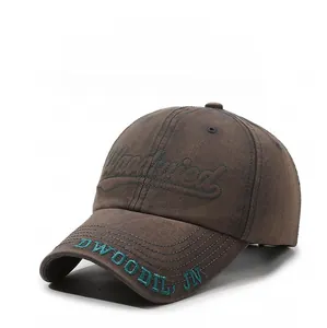 Detailed embroidery on dark brown cotton baseball cap with ventilation eyelets