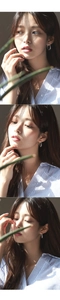 Detailed view of intertwined wave hoop earrings and a minimalist ring on a female model