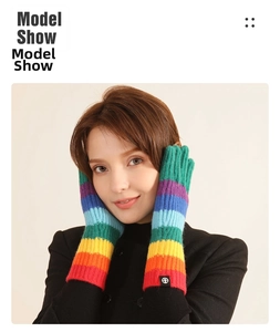 Rainbow striped knit gloves worn by model, showing colorful soft texture and elastic fit