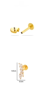 Detailed view of gold F136 titanium earring with marquise zircon stones and flat back post