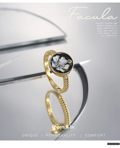Macro shot of retro lotus ring with black enamel, gold bead texture, and micro zircon