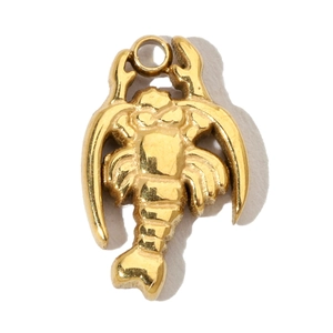 Detailed close-up of a golden scorpion pendant made of stainless steel with a top ring