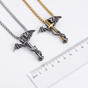 Detail of dragon and sword pendant size measurement with ruler for scale 5.2cm height