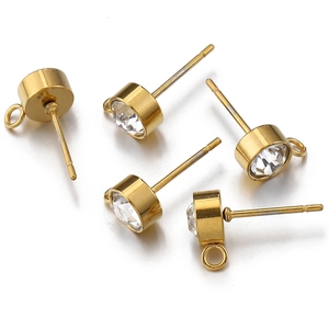 Macro shot of gold-plated stainless steel stud earring settings with zircon and side loops