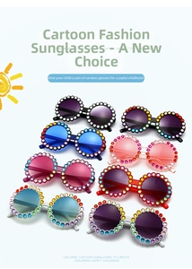 Close-up of kids' round sunglasses with colorful rhinestones in multiple vibrant colors