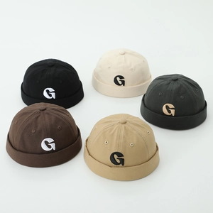 Kids brimless miki hats with 3D letter embroidery in five versatile neutral colors
