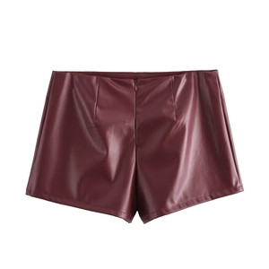 Rear view of burgundy PU leather shorts with a hidden back zipper and glossy finish
