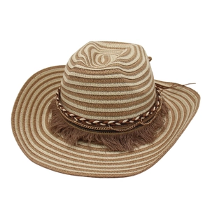 Detail of bohemian striped straw cowboy hat with fringe trim and metal chain accents