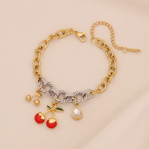 Golden stainless steel cherry bracelet with red enamel fruit and clear zircon pendant