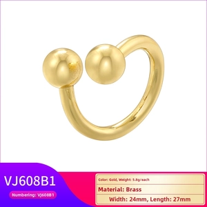 Macro shot of 24mm gold brass C-shaped double ball earrings with weight specifications