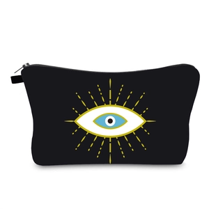 Waterproof Evil Eye makeup bag in black canvas with golden eye embroidery design