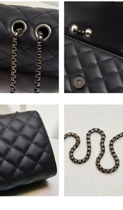 Close-up of diamond quilted texture, metal chain, and magnetic buckle on black crossbody bag