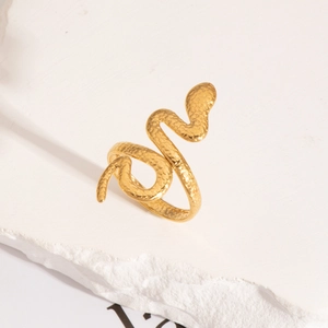 Detailed view of snake open ring in gold finish with unique hammered texture design